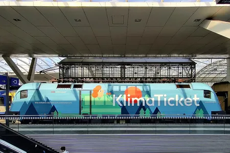 A train in Austria displays an ad for the Klimaticket.