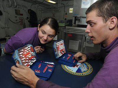 110930-N-VA840-013
ARABIAN SEA (Sept. 30, 2011) Airman Dyani M. Daniels, left, and Aviation Boatswain's Mate (Fuel) Airman Clayton W. Sahr play �Battleship� during a game tournament sponsored by the Morale, Welfare and Recreation (MWR) department aboard the aircraft carrier USS George H.W. Bush (CVN 77). George H.W. Bush is deployed to the U.S. 5th Fleet area of responsibility on its first operational deployment conducting maritime security operations and support missions as part of Operations Enduring Freedom and New Dawn. (U.S. Navy photo by Mass Communication Specialist 3rd Class Leonard Adams/Released)