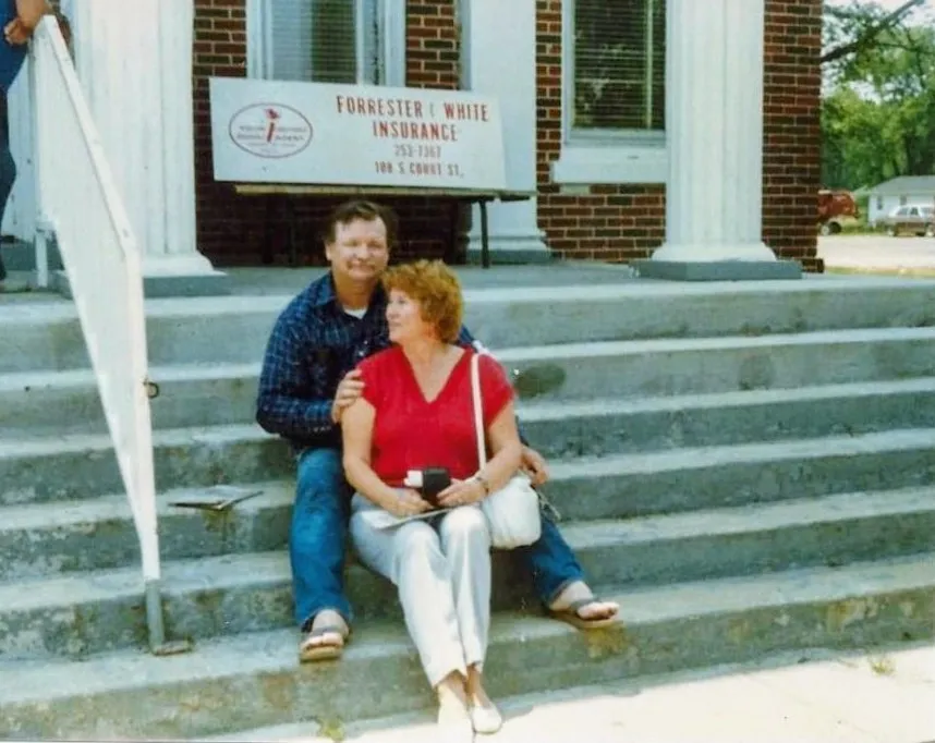 Brandon and one of her brothers, sitting on the courthouse steps in Tiptonville 45 years after they met Tann