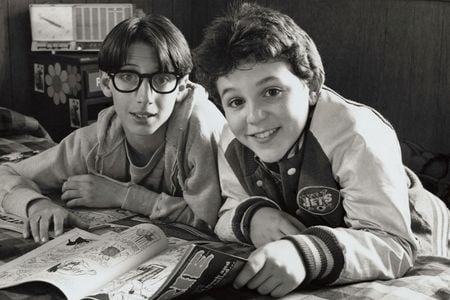 Fred Savage (right) and Josh Saviano (left) of "The Wonder Years" reunited at the American History Museum on December 2, 2014 to donate items, including the New York Jets jacket shown here in a publicity photo from around 1988.
