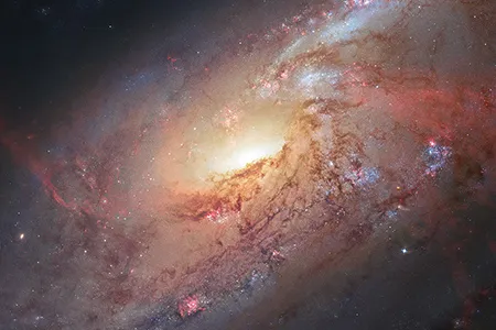 Galaxy M106 as captured by the Hubble Space Telescope.