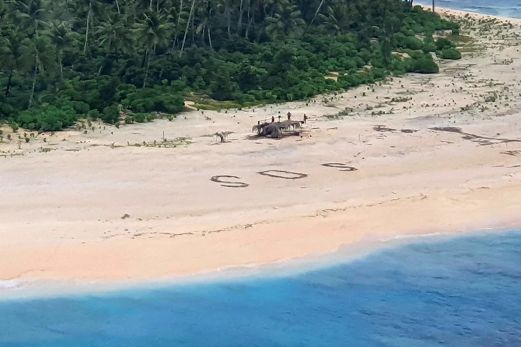 SOS sign on island