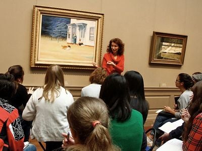 Teaching artist Mary Hall Surface stands in front of Edward Hopper’s 1939 painting Cape Cod Evening at the National Gallery of Art. Surface will lead a creative writing workshop for Smithsonian Associates at the Freer Gallery of Art on March 27. 