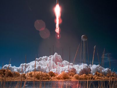 Orbital&#8217;s Antares rocket takes off from Wallops Island, Virginia, with the Cygnus cargo ship on top.