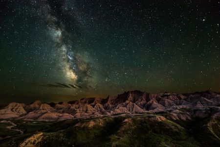 Camping in Badlands National Park is an otherworldly experience. Fall asleep beneath a canopy of stars. 