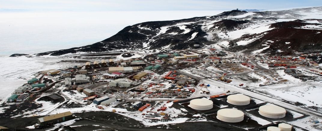 A town on the ocean in winter.