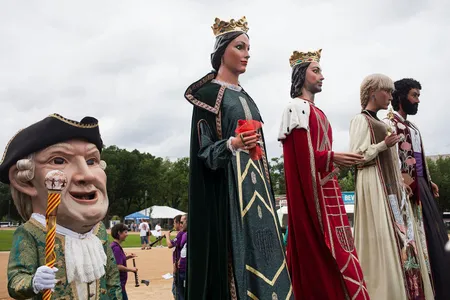 The giants and big heads have been a hit among Folklife Festival-goers, says performer Jesus Bach Marques. "They're amazed by our giants! For most of them, it's something really new."
