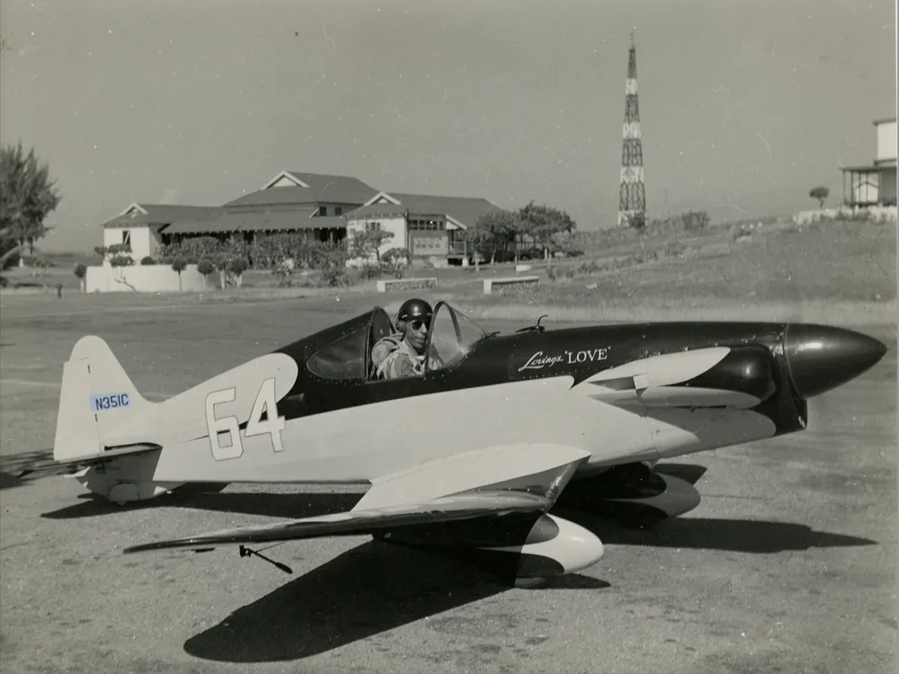 Neal V. Loving in his plane, Loving's Love, in 1954