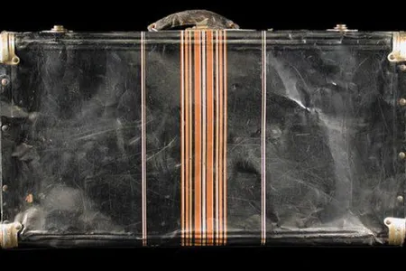 This black metal suitcase belonged to Iku Tsuchiya. It went with her to Tanforan Assembly Center, then to the Topaz camp, and back home to San Leandro, California.
