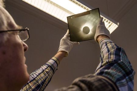 A photographic plate of the 1919 total solar eclipse, taken by Andrew Claude de la Cherois Crommelin and Charles Rundle Davidson during an expedition to Sobral, Brazil. The 1919 eclipse was used by Arthur Eddington, who observed it from the island of Principe off the west coast of Africa, to provide the first experimental evidence of Einstein's theory of relativity. 
