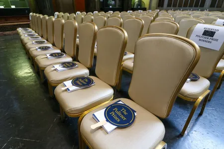 Chairs sit ready for the attendees of the ceremony recognizing 2020 and 2021 Pulitzer Prize winners.