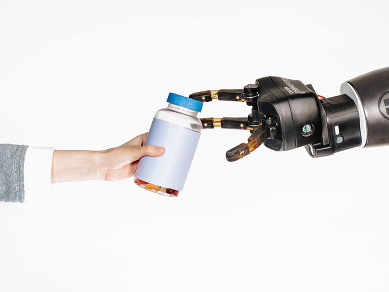 Human reaching out to robot-main.jpg
