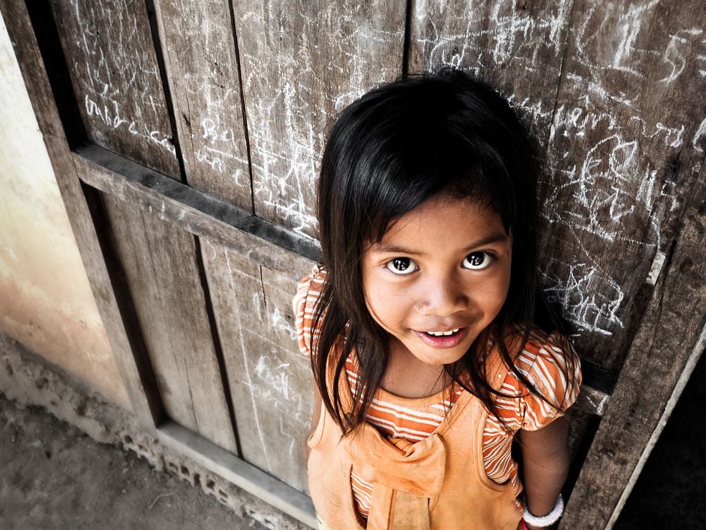 A Portrait Of Cheerful Vietnamese Girl In The Central Highlands Region Of Vietnam Standing
