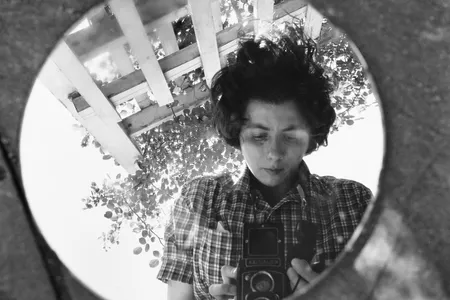 A self-portrait of Vivian Maier from 1953