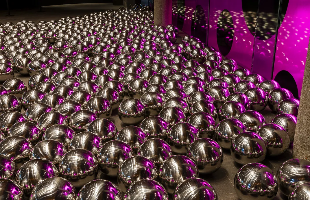 Silver balls next to each other on the floor