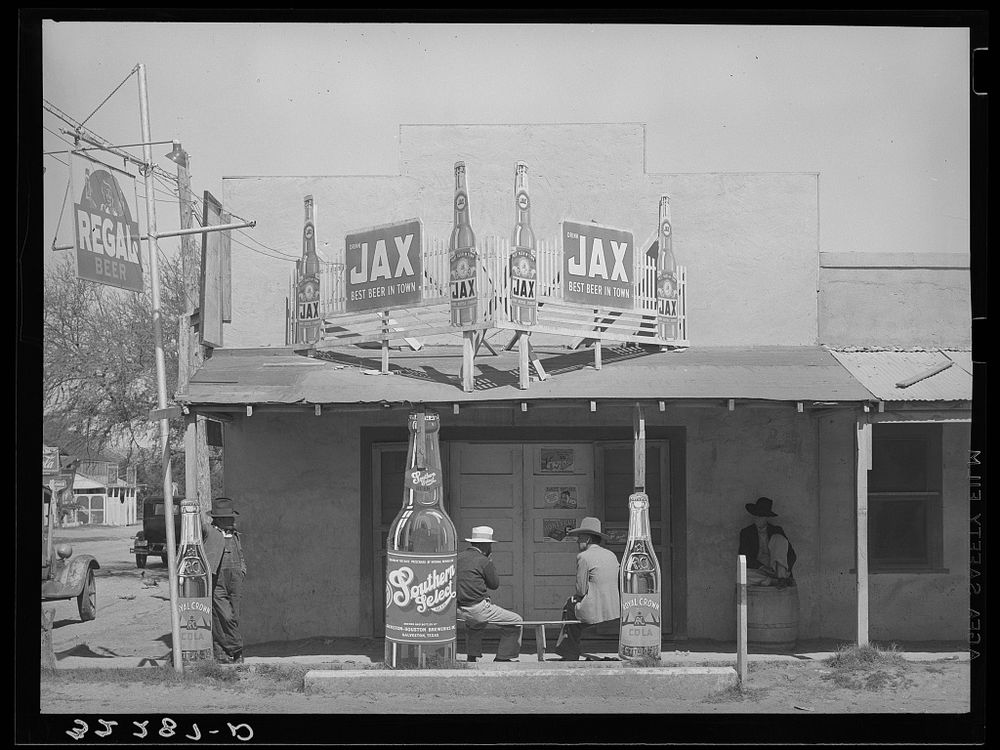 Black and white photograph of a the façade of a Mexican beer hall in Texas.