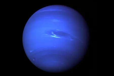 Neptune, which appears blue because of methane in its atmosphere, has a strange set of moons.