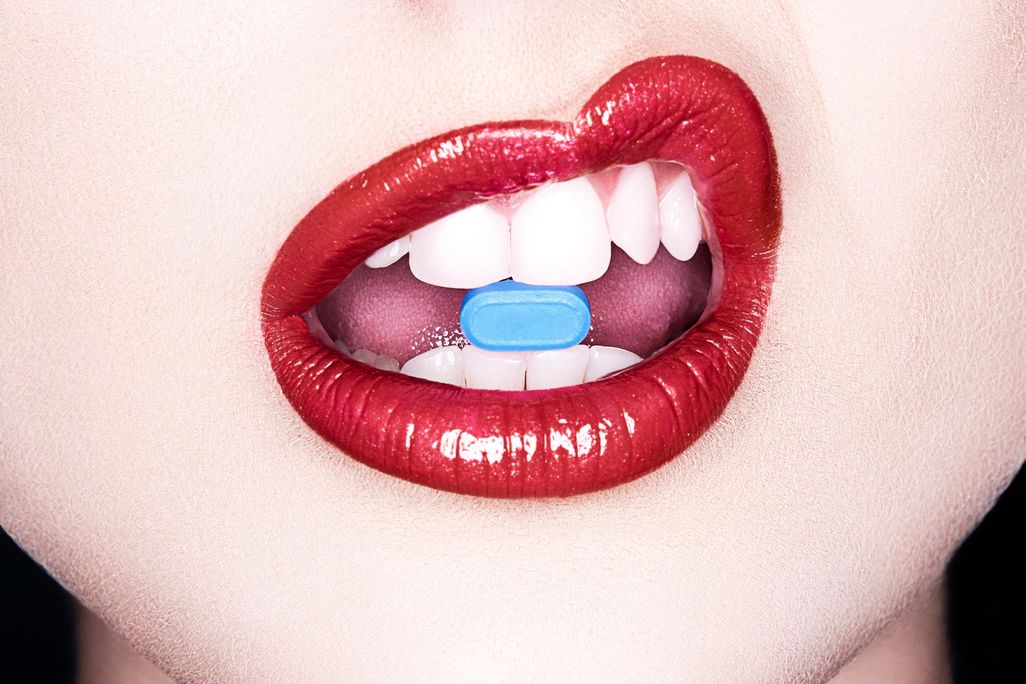 Woman Taking Pill