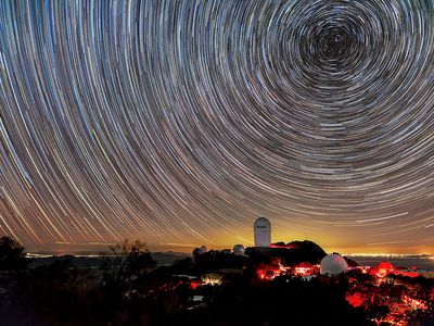 DESI, seen here beneath star trails, aims to create a 3D map of the universe.