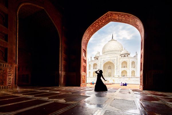 Showing Pain by Portrait in her body posture before Taj mohal related to its history. Nikon D5 14-24 mm lens thumbnail