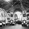 Smithsonian’s Arts and Industries building decorated for James Garfield’s inaugural ball, complete with string light garlands and patriotic buntings.