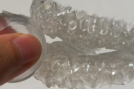 Blizzident is similar to a mouth-guard, but it is lined with rows of bristles.