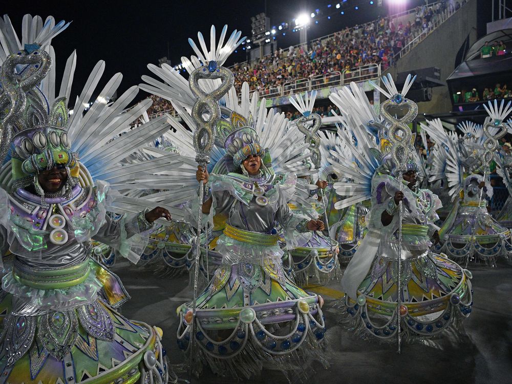 Members of Portela samba school perform during the second night of Rio's Carnival parade at the Sambodrome Marques de Sapucai in Rio de Janeiro, Brazil on April 23, 2022.
