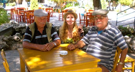 American backpacker Julia Pasternack shares a moment with two Turkish gentlemen.