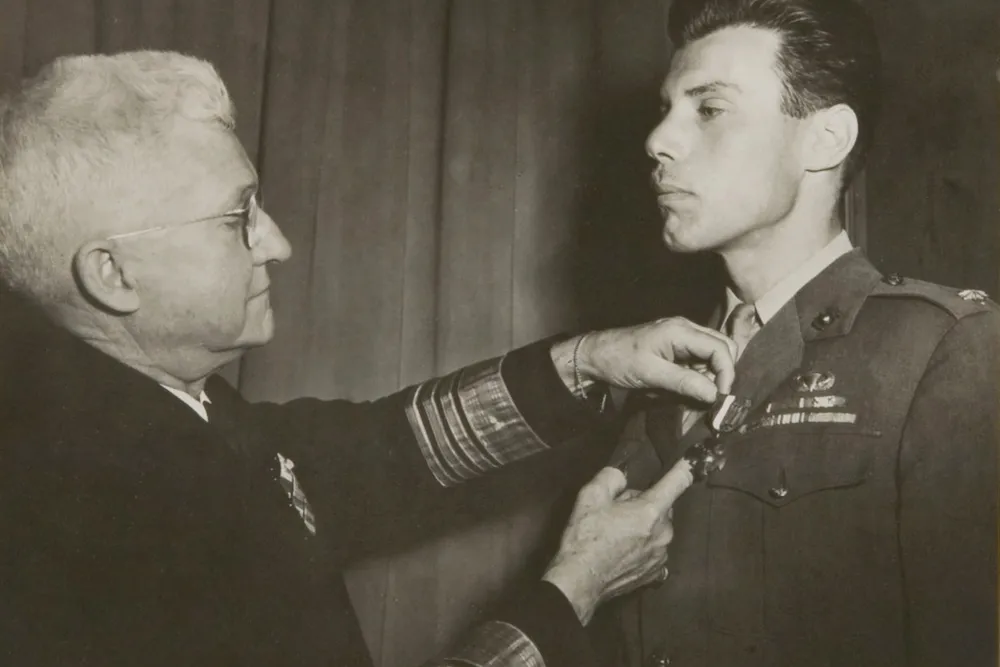 Ortiz receives the first of the two Navy Crosses he was awarded for extraordinary heroism during World War II.