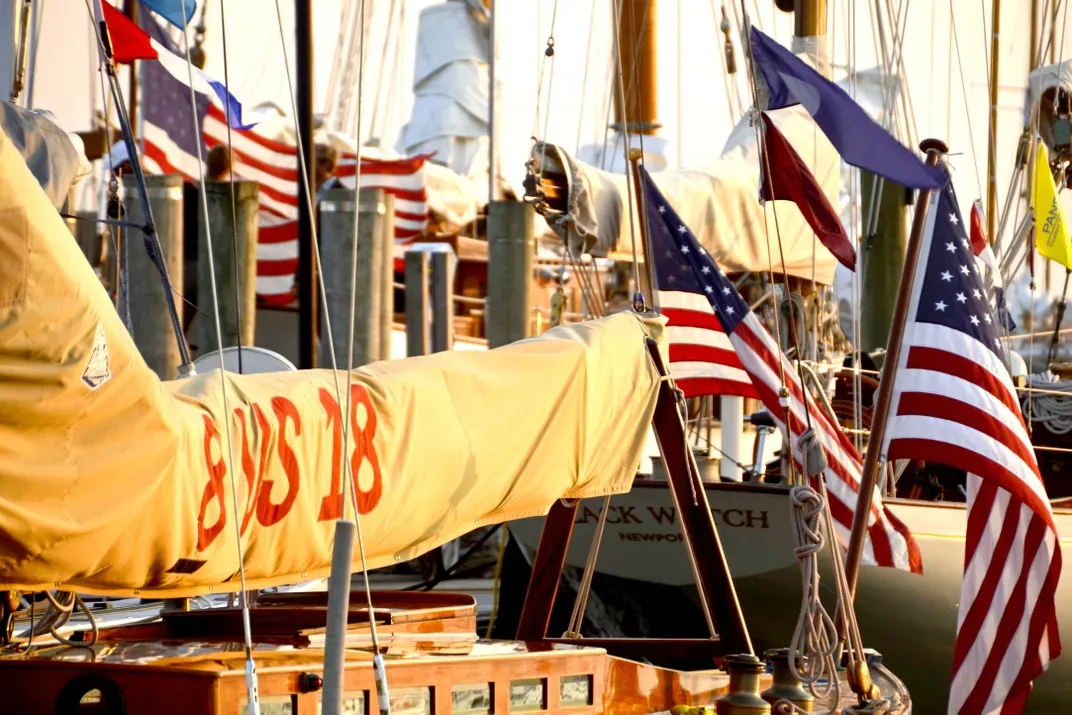 11 - American flags hang from sailboats at the Herreshoff Marine Museum pier during the annual yacht regatta in Bristol, Rhode Island.