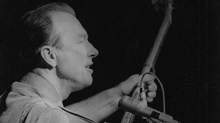 Pete Seeger performs at a peace rally in New York City, 1965.