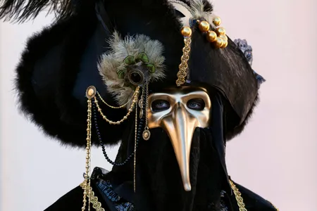 The Black Death is immortalized by the plague masks of Venice, like this stylized version used in a Carnival costume.