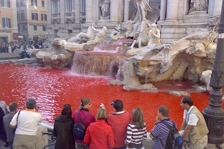 The Trevi Fountain’s waters turn red.