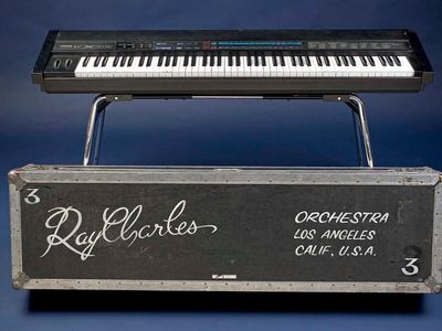 While on tour in the 1980s and 1990s, Ray Charles played this Yamaha KX88 electronic keyboard MIDI controller, customized with Braille.