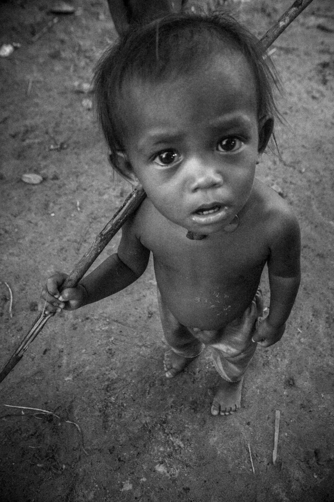 Child of Cambodia----nothing much but rice fields, plants and faces of ...