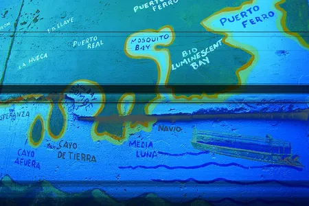 This mural outside of an outfitter&#39;s office illustrates the snaking mouth of Mosquito Bay.