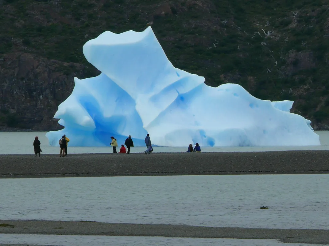 Travelers admire surreal ice formations. Credit: Peter Kibbee