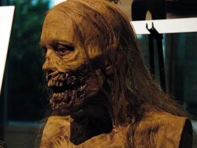 A bust of the legless "bicycle girl" zombie executed by Rick Grimes in the Walking Dead pilot.