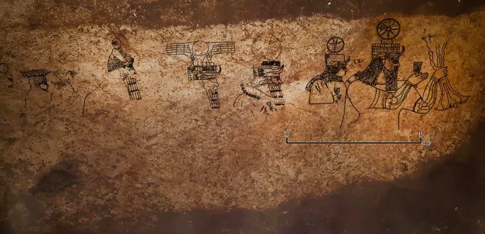 Artistic painting on the Assyrian rocks showing the procession of the gods