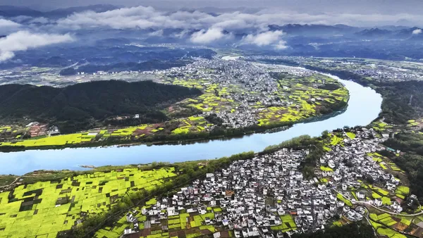 The river through spring village thumbnail