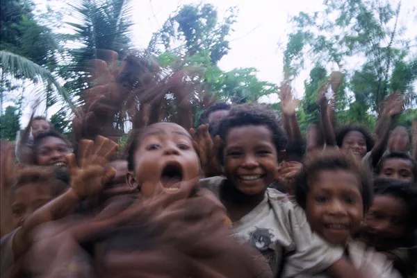Waving children in Papua New Guinea thumbnail
