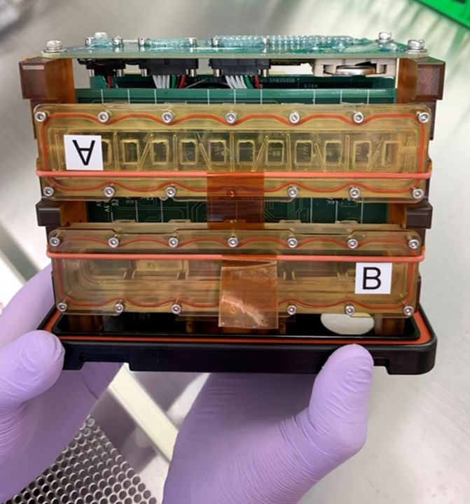 Tissue chambers loaded into a plate habitat designed for research aboard the International Space Station