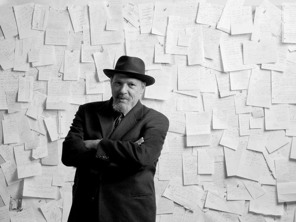 August Wilson with arms folded