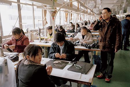 China produces about two-thirds of the world's shoes, and its unofficial shoe-making capital is Wenzhou (Chen Wenyi makes a call at the Heyu Shoe Materials Company). Says one factory owner: "Wenzhounese work harder than anyone else in China."