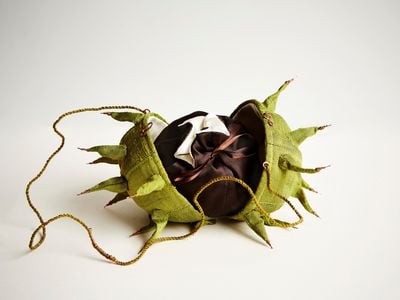 A whimsical bag designed to look like a European horse chestnut, made by contemporary British designer Emily Joe Gibbs