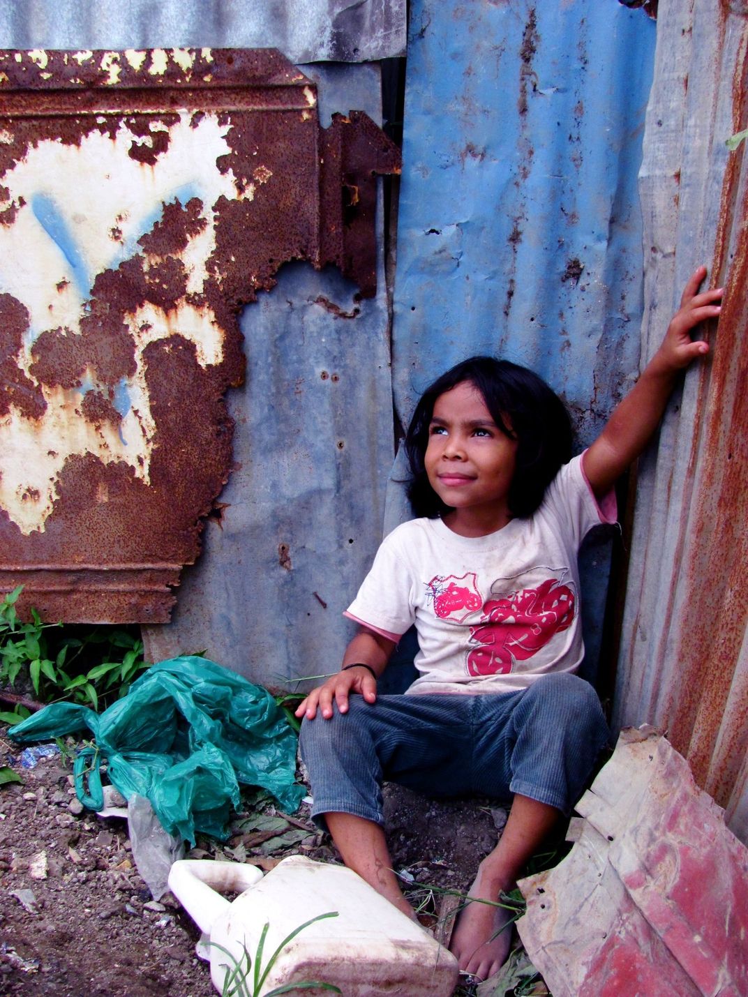 In La Carpio, the slum of San Jos, Costa Rica, a child poses in what he ...