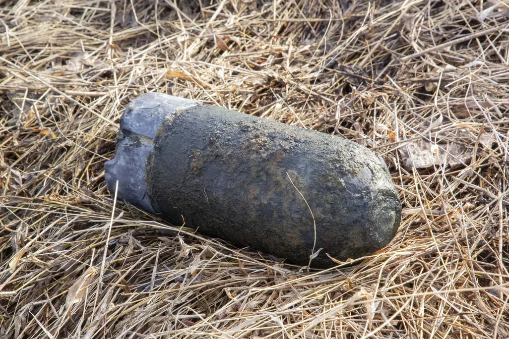 Military shell on the ground