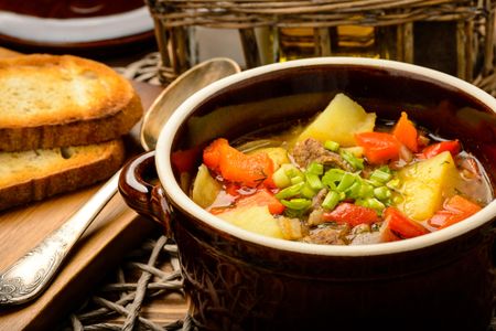 Goulash began as a humble soup-stew, cooked over an open fire by Hungarian herdsmen. The addition of refined varieties of paprika from ground red chilies made the dish an international staple.