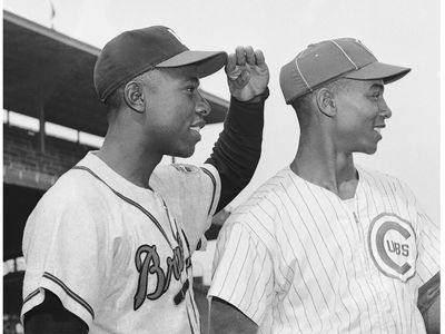 Hank Aaron and Ernie Banks before a game at Wrigley Field, 1957