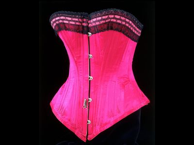 This silk satin, lace and whalebone corset gave an 1890s lady her hourglass figure and tiny waist. 